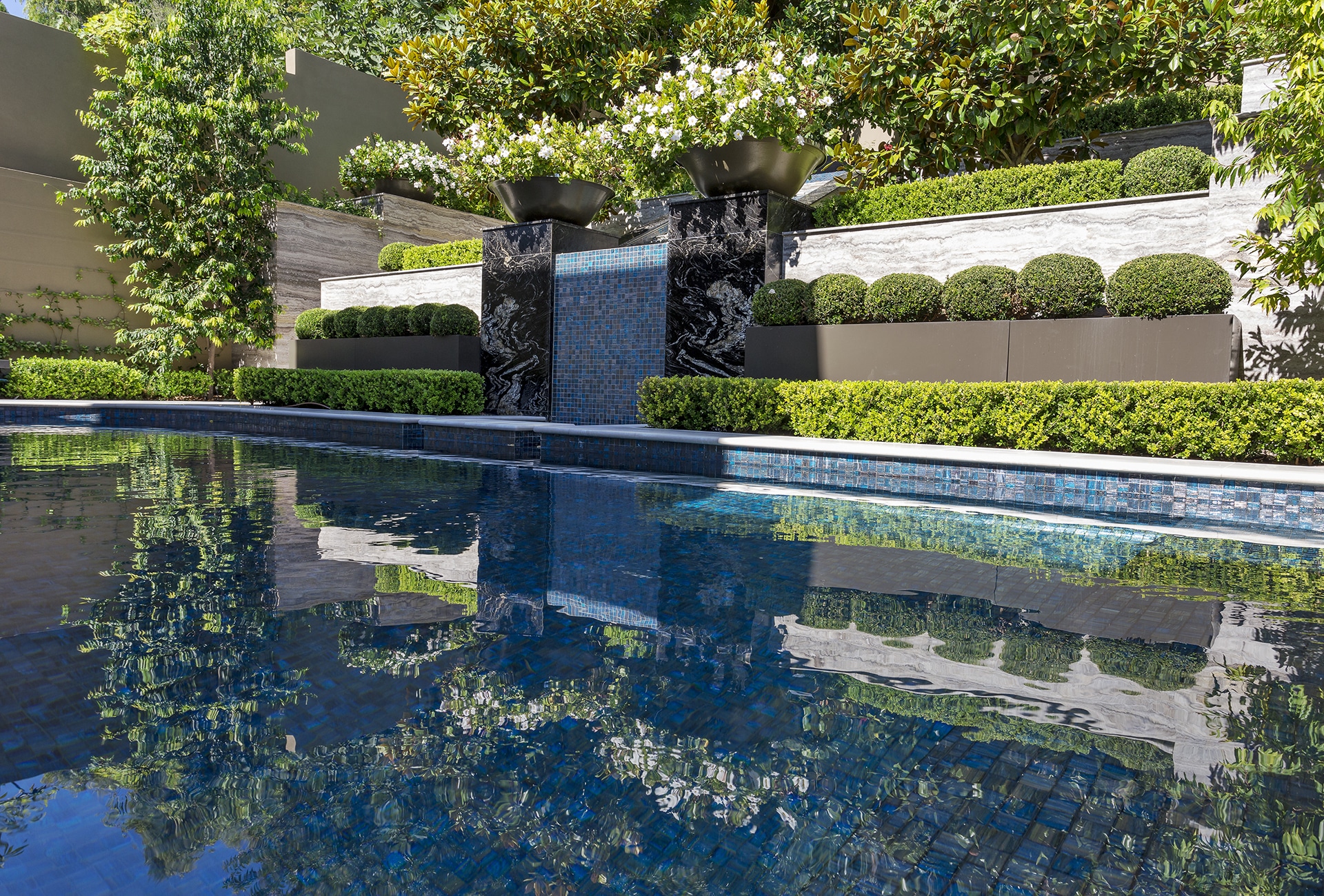 A regal, formal water feature and pool