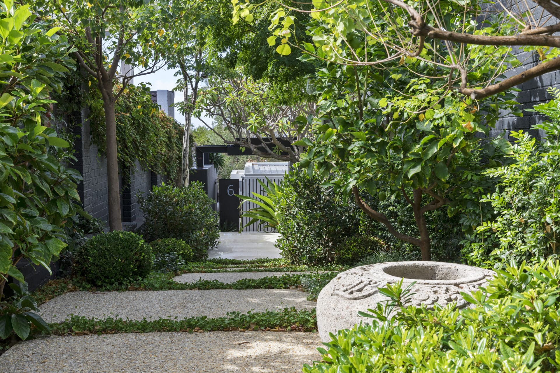 exposed aggregate steppers in a mosman park garden